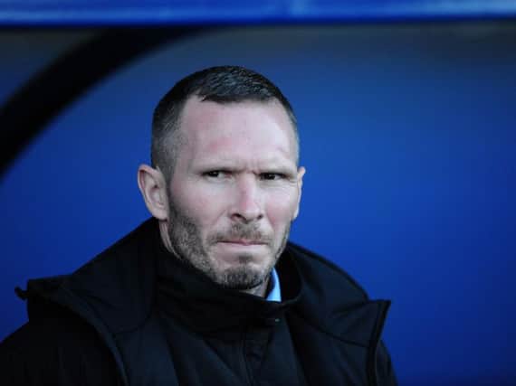 Michael Appleton is now in charge at Sincil Bank