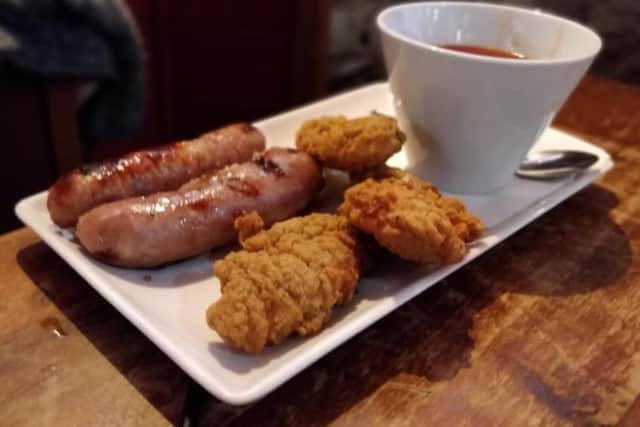 The children's mix 'n' match, comprising of sausages, chicken goujons, and baked beans