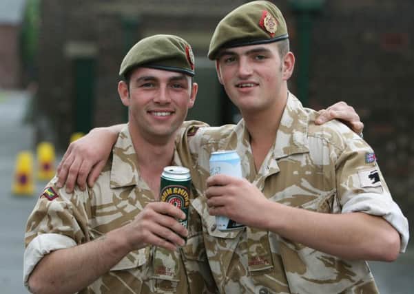 Ben Riches, right, in his army days. Pictured with his brother Steve