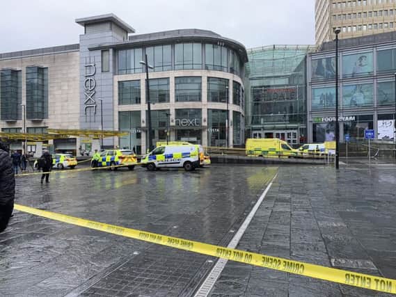 A man has been arrested and detained under the Mental Health Act after five people were injured in a knife attack at the Arndale Centre in Manchester.