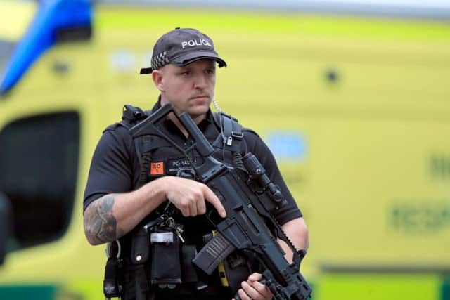 Armed police have been deployed in response to a knife attack at Manchester's Arndale Centre that left five people hurt.