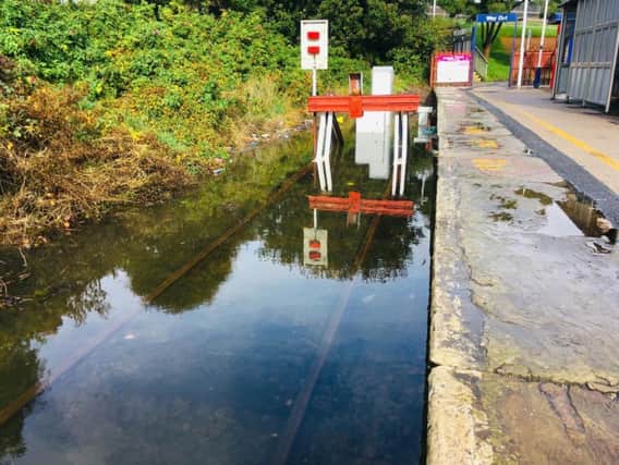 Train lines flooded in Lancashire last week, disrupting rail services. Credit: Nodrog