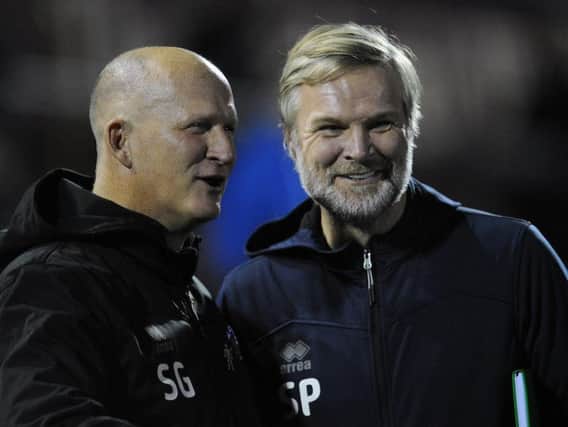 Steven Pressley pictured with Simon Grayson before the game