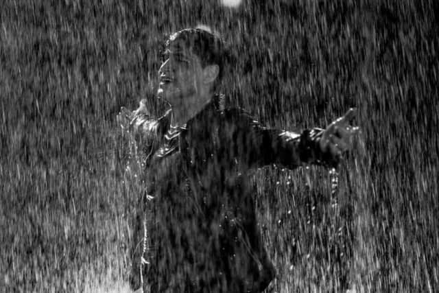 The band brave the elements to entertain their fans. Picture: The Script.