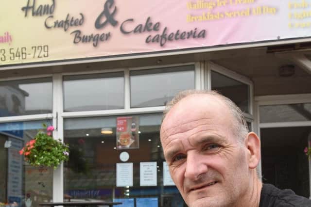 Paul Graham owns Hand crafted burger and cake cafeteria, and said the business rates he pays are "a struggle" to maintain.