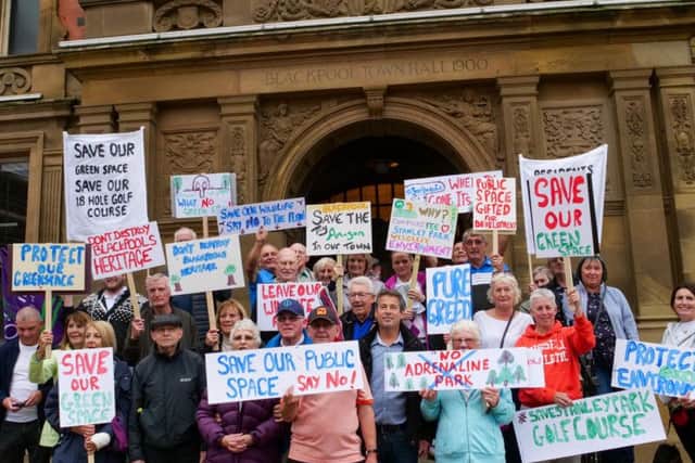 Campaigners holding a protest outside Blackpool Town Hall