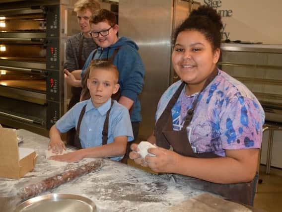 Children, young people and Aspired Futures staff held a fund-raising pizza night at Phils Bakery, St Annes, to raise money for the organisation, which supports vulnerable children and young people