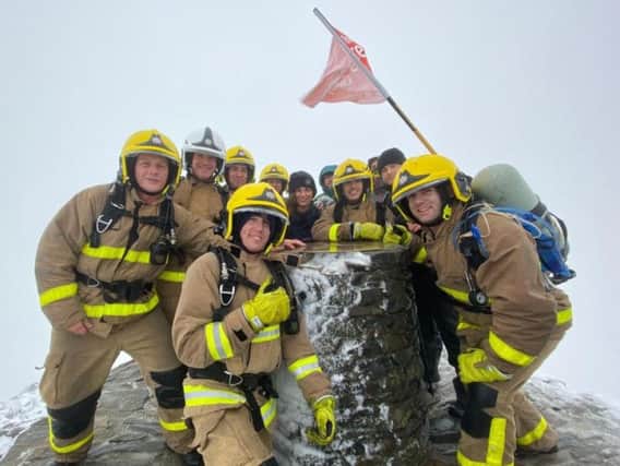 Firefighters from Blackpool and St Annes fire station climbed Snowdon