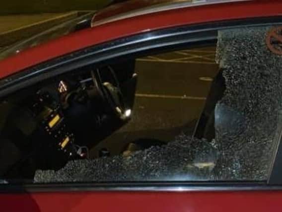 A damaged taxi window (Image: Blackpool Police)