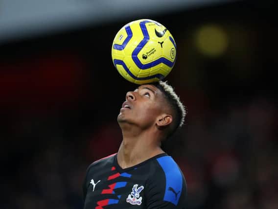 Patrick van Aanholt of Crystal Palace with the Nike Merlin winter ball on his head (Photo by Catherine Ivill/Getty Images)