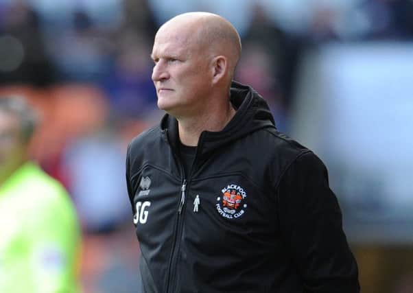 Blackpool manager Simon Grayson wants his players to be braver in possession