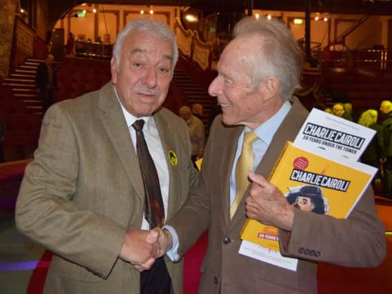 Charlie Cairoli Jr  (left) at the launch of the new book,  'Charlie Cairoli- 39 years under the Tower'.He is pictured with Brian Somerville, the son of former Tower white face clown Paul King , who has a copy of the book. Photo: Juliette W Gregson.