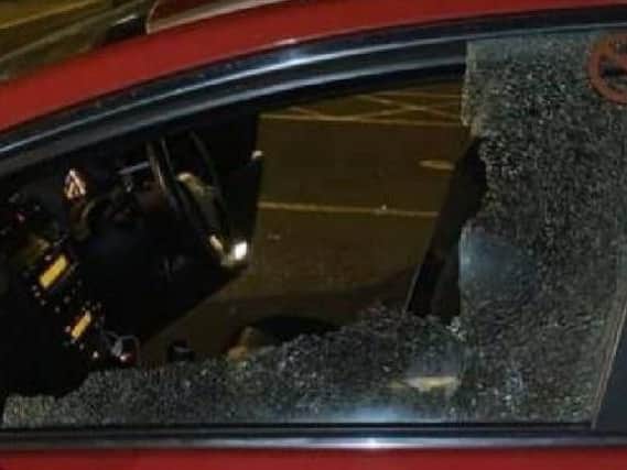A damaged taxi window (Image: Blackpool Police)