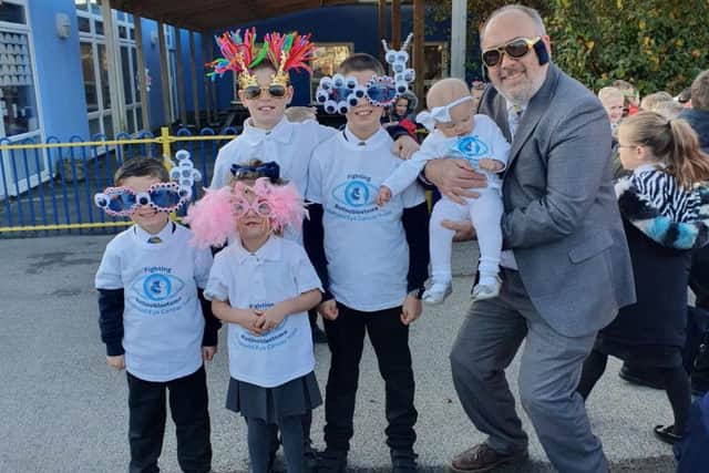 Anchorsholme Academy's headteacher Mr Dow with Elsie Mottram, her brothers Ollie and Charlie and her cousins Olivia and Brodie.