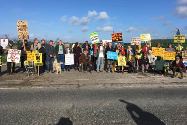 People outside the gates at the Preston New Road drill site