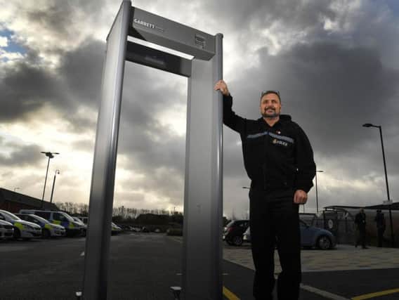 Sgt Warren Jones with the new knife arch for Blackpool police