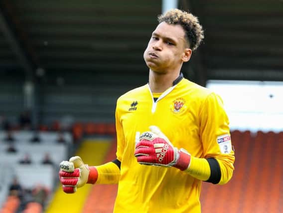 Goalkeeper Christoffer Mafoumbi is one of three Blackpool players to receive an international call-up