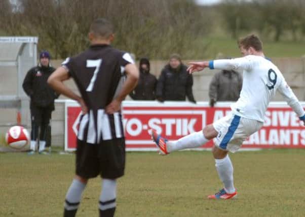 Adam Farrell curls a lovely free kick in for Fylde's first goal