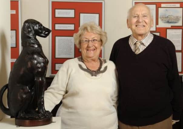 Inns and hotels exhibiton at the Lytham Heritage Centre.  Pictured is Sharon Wood and Alan Ashton with the Talbot Dog.