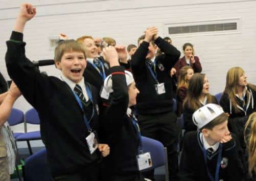 The victorious pupils from Millfield School celebrate winning the £10,000 competition.