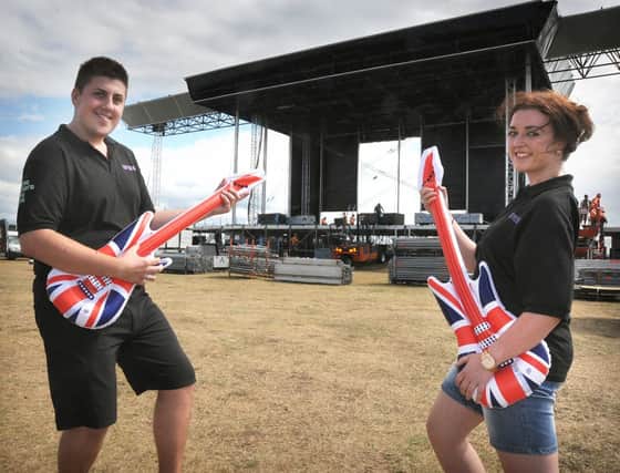 The arena and stage for next weekend's Lytham Proms are being constructed on the green, with teams of riggers and builders putting the giant stage together.  
Box Office Co-ordinator Brett Davis and Volunteer Co-ordinator Emma Donne get into the proms spirit.  PIC BY ROB LOCK
30-7-2013