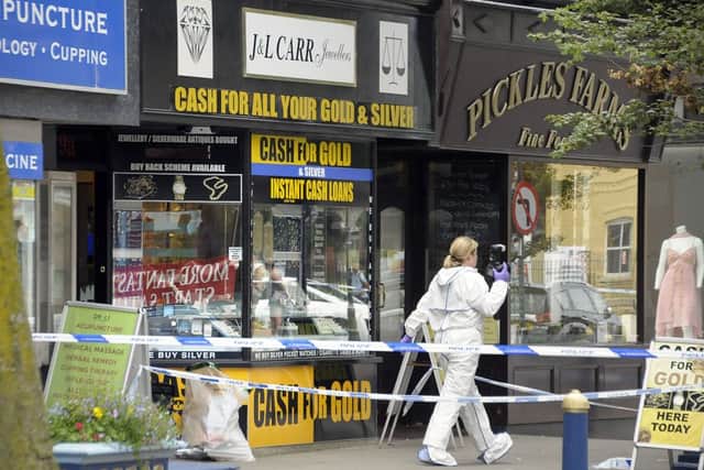 Police and CSI officers at St Annes after the armed robbery at J & L Carr Jewellers, Garden Street.