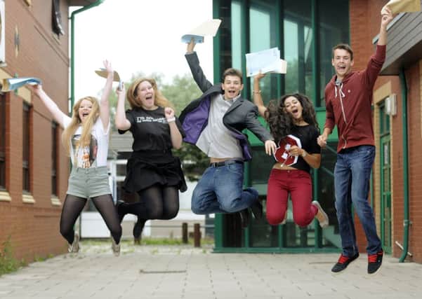 Lytham St Annes High School pupils celebrate their GCSE results, L-R Kira Curtis, Halle Wood, Tristan Gross, Noor Al-Shawi and Ben Watson.