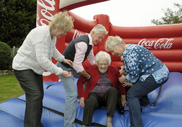 Mary Murphy of Lomond Avenue, St Annes, celebrated her 100th birthday on Saturday 21st September. Mary on the bouncy castle with her children Frank Murphy, Pat Murphy, Gaye Lemmon and Jean Gerrie.