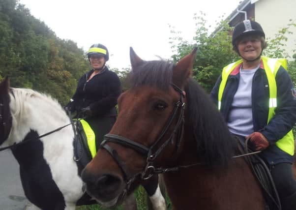 Liz Jackson, 42, left and Lynn Whiteside, 65, horseriders fearing a rat-run has been created between Division Lane and the Moss Road in Marton after the closure of Wild Lane