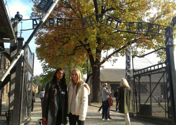 AKS Lytham students Kitt Chabba, left and Lucy Dale visit Auschwitz, Poland.