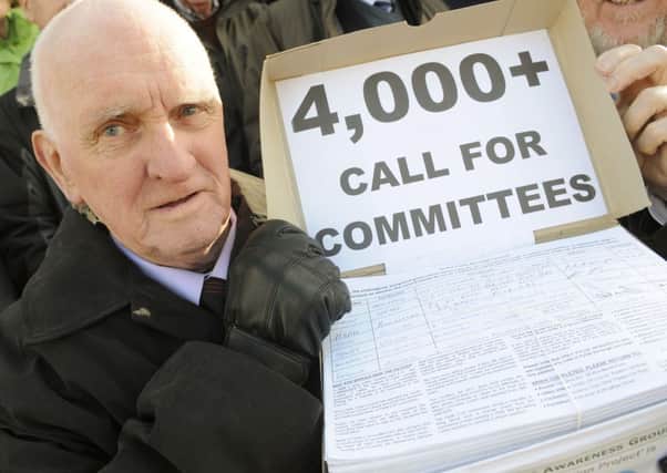 Fylde Civic Awareness Group chairman Jon Harrison with the petition