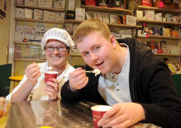 Michael Willacy and Elaine Silverwood sample the Reindeer Dash Ice Cream at SilverDell, Kirkham.
