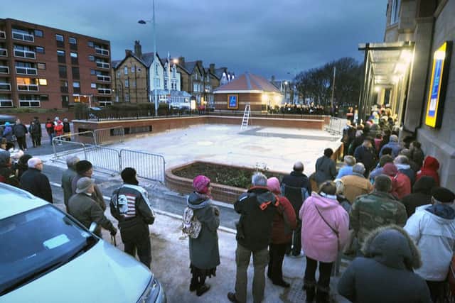 Queues line up to get in Aldi yesterday morning and (below) shoppers Harriet Goodier (left) and Helen Bonney who arrived at 5am.