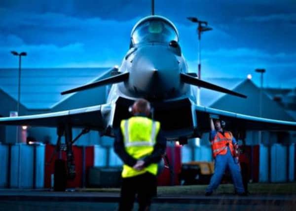 A Eurofighter Typhoon being prepared for takeoff