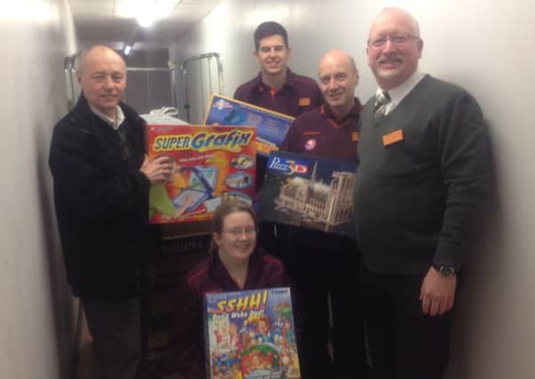Staff from Sainsbury's in St Annes donated toys and games to Day of Sunshine children's charity.