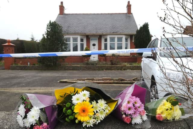 Floral tributes outside the house on Lytham Road in Freckleton.
