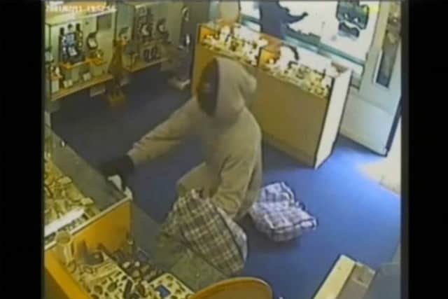 CCTV footage of an armed raid at a St Annes jewellery store.