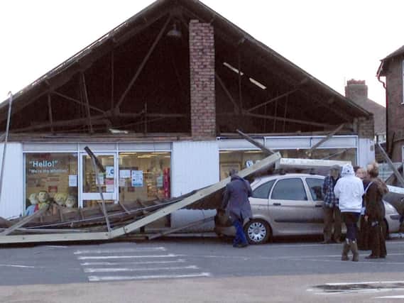 Whitworth chemist, Bloomfield Road, after the front wall was blown off by gale-force winds