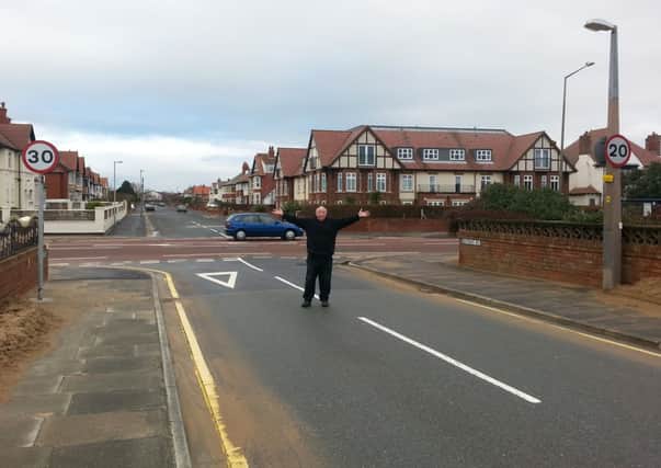 Tony Ford with different speed road signs at Bentinck Road, St Annes.