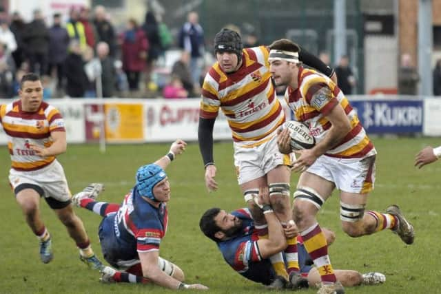 Joe Robinson makes a break for Fylde