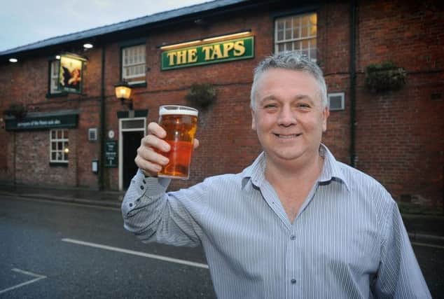 Well-known local landlord Steve Norris has taken over at The Taps pub in Lytham.
Steve outside the pub. PIC BY ROB LOCK
7-1-2013