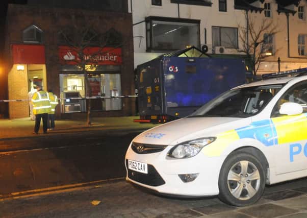 The scene outside Santander bank in Lytham following the raid last year