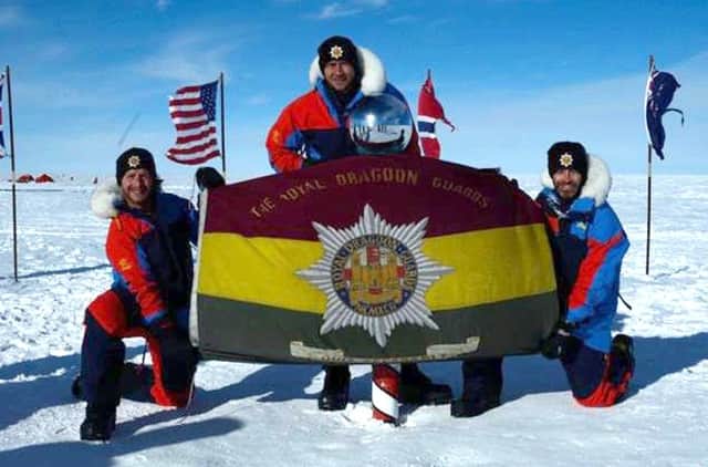Lance Cpl Nick Webb (centre), of the Royal Dragoon Guards, is walking across the Baffin Islands, in Canada, to help wounded soldiers