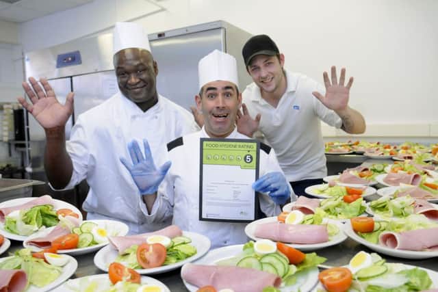 The kitchens at Blackpool Victoria Hospital have been rated 5 stars by inspectors.  Pictured is kitchen manager Darren Cadwell with Simon Phillips and Andrew Lockwood.