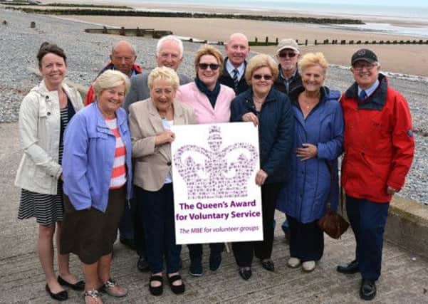 Cleveleys based Rossall Beach Residents and Community Group are delighted to have been chosen as one of just two groups in Lancashire to receive the prestigious Queens Award for Voluntary Service (QAVS) for 2014 - the MBE for groups of volunteers who work in their local community for the benefit of others.