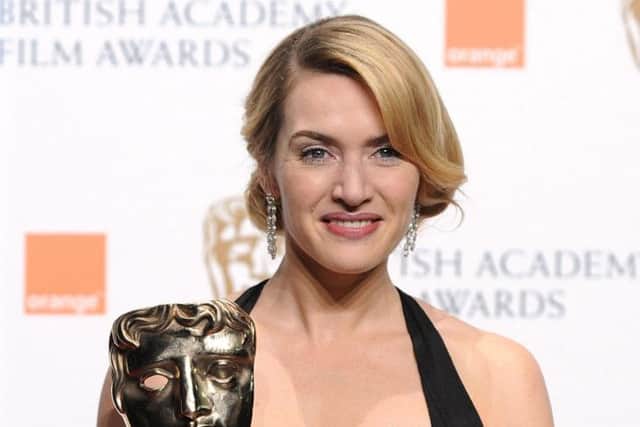 File photo dated 8/2/2009 of Kate Winslet with the Best Actress award received for The Reader at the 2009 British Academy Film Awards. The actress became a Commander of the British Empire (CBE) in the Queen's Birthday Honours List published today.  PRESS ASSOCIATION Photo. Issue date: Saturday June 16, 2012. See PA  HONOURS stories. Photo credit should read: Ian West/PA Wire