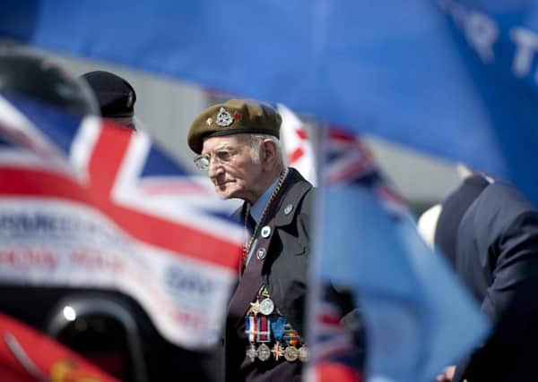 Seventy years_of_memories: Member of the D-Day & Normandy Veterans Association Robert Coupe, 89, at Blackpools Cenotaph to show respect for comrades who died on D-Day and in the months afterwards
