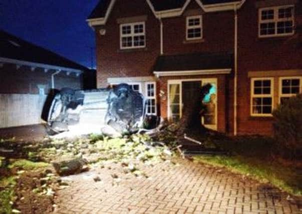 Car smash: This is the damage caused after a car crashed into a £500,000 home on Lytham Quays  remarkably no-one was injured