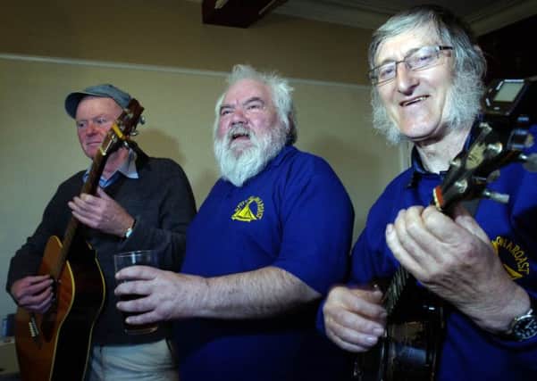 Sounds great:  Fleetwood Folk Club at Strawberry Gardens pub, Poulton Road, Fleetwood. From left - Tony Mason, Mike France and Alan Middleton