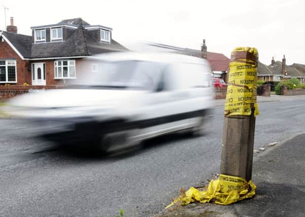 High risk: A broken lamp post on Carr Head Lane, Poulton. Thousands of lamp posts in Wyre have been labelled high risk and needing repair or replacing